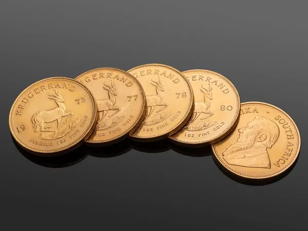 Monedas de oro Krugerrand y Centenario